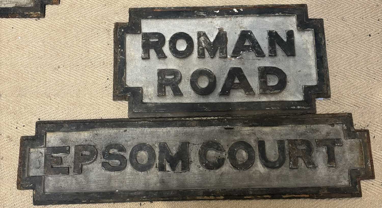 Lot 1344 - Two Victorian cast metal signs, 'Roman Road',...