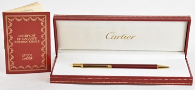 Lot 453 - CARTIER; a boxed ballpoint pen, with original...