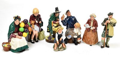 Lot 400 - ROYAL DOULTON; a collection of seven ceramic figures