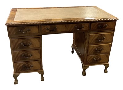 Lot 27 - An early 20th century walnut pedestal desk,...