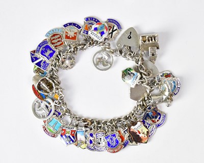 Lot 1060 - A hallmarked silver bracelet set with various...