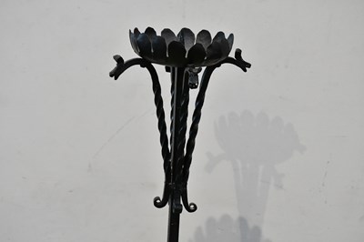 Lot 2408 - A pair of wrought iron pricket candle stands...