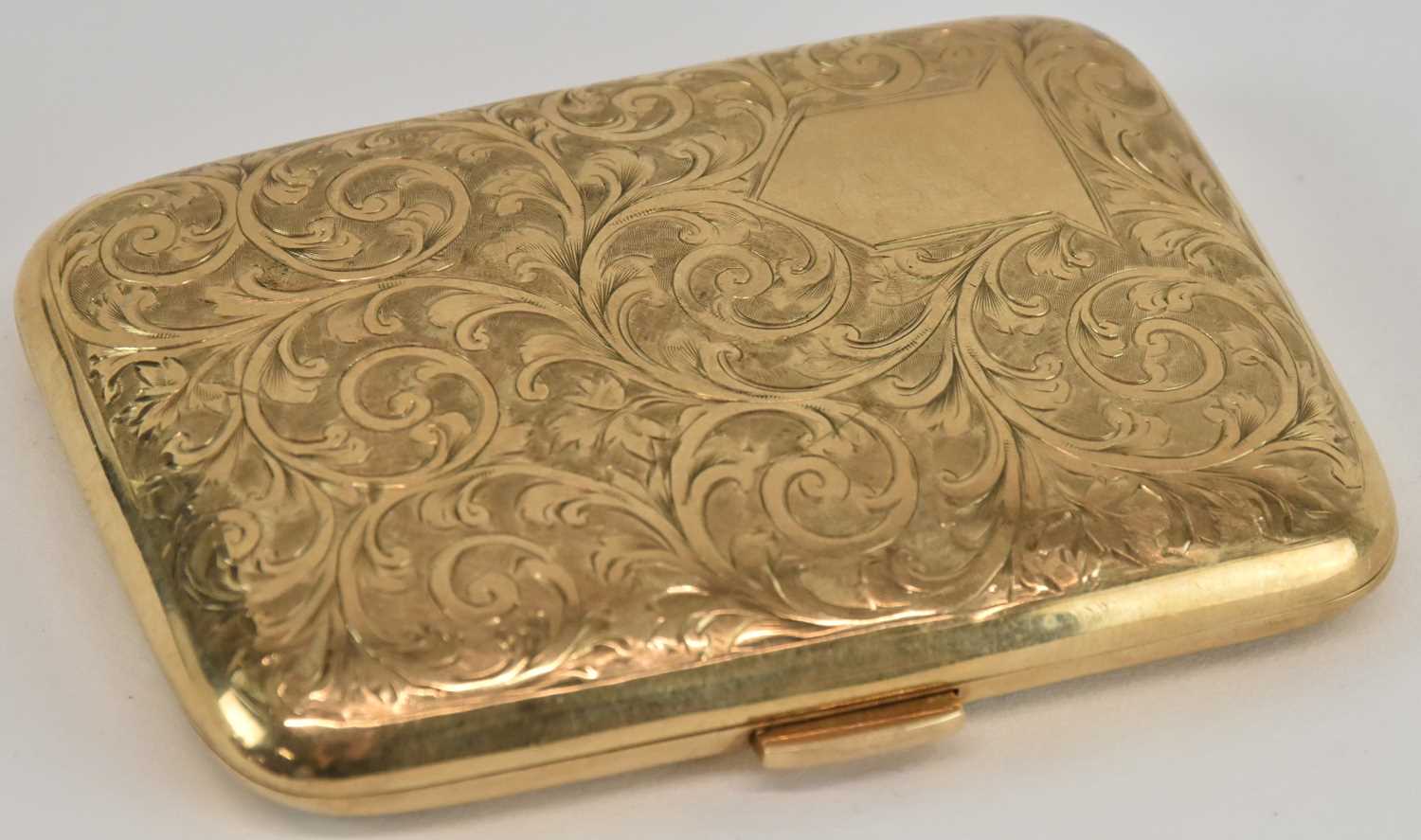 Lot 1095 - A 9ct gold breast pocket cigarette case with...