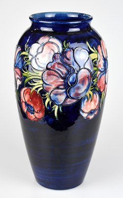 Lot 29 - WALTER MOORCROFT; a large 'Anemone' pattern...