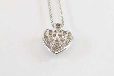 Lot 1200 - An 18ct white gold diamond chip heart shaped...