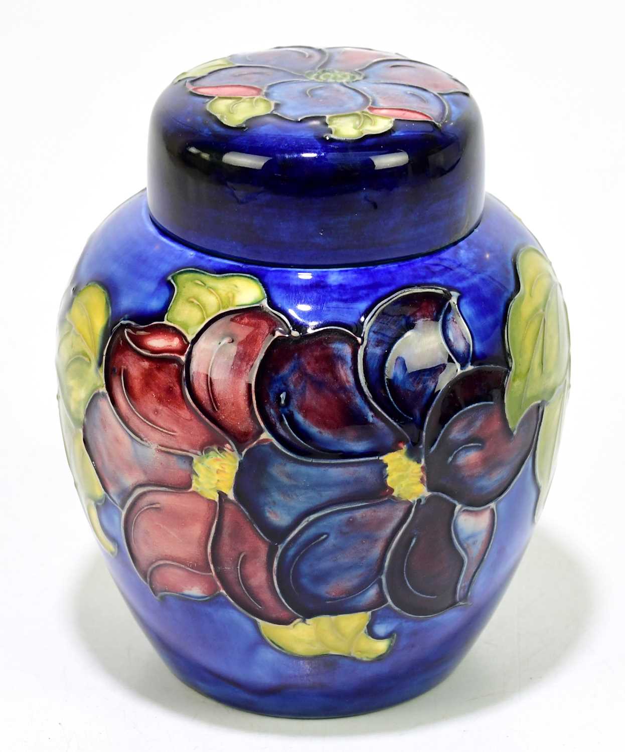 Lot 49 - MOORCROFT; an anemone pattern ginger jar and