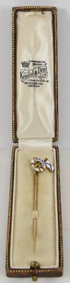 Lot 357 - A yellow metal and enamel naval pin, 'Mabel',...