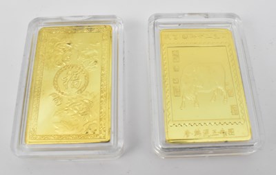 Lot 1569 - A cased set of twelve gold plated ingots to...