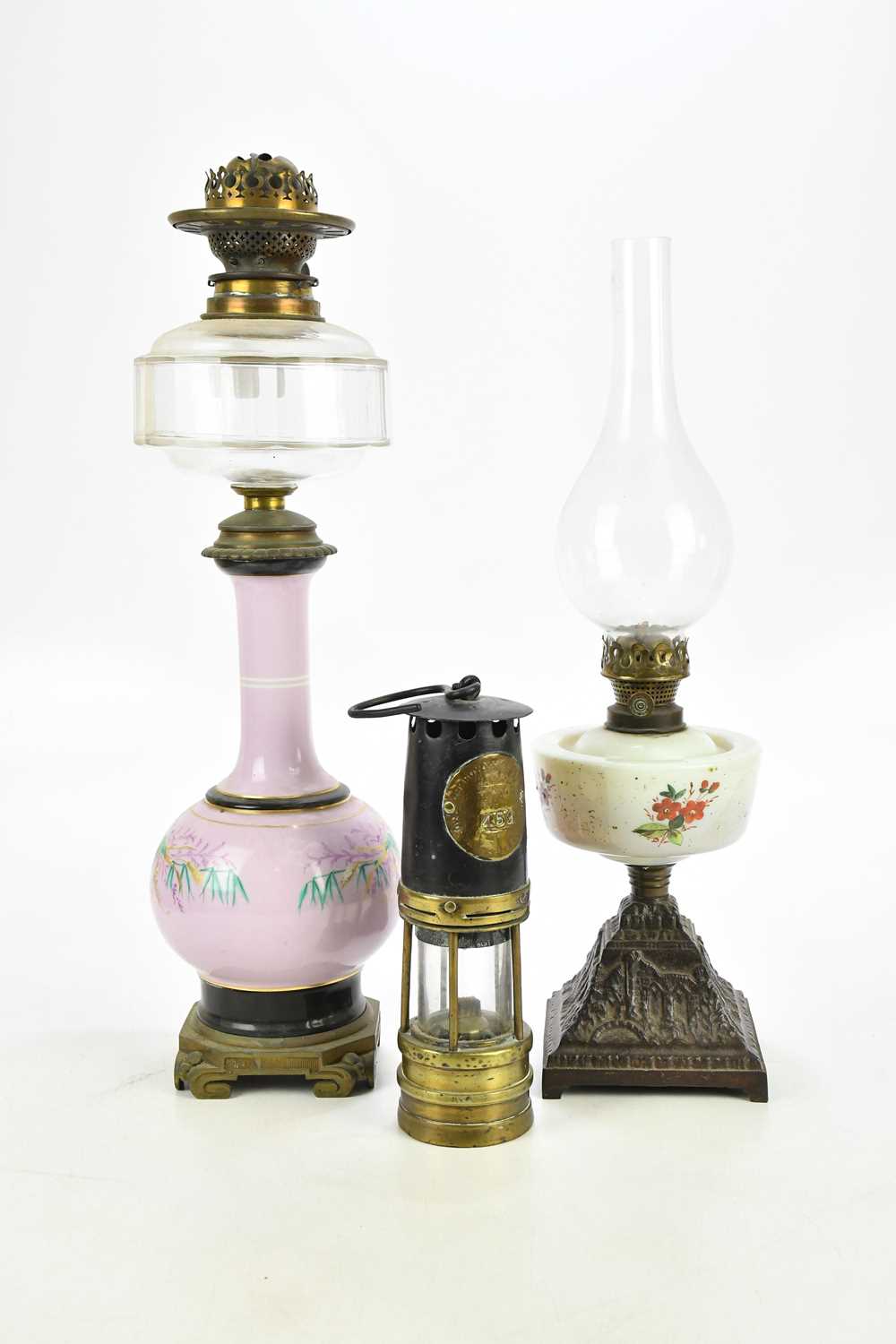 Lot 2431 - A hand painted pink glass oil lamp, with...