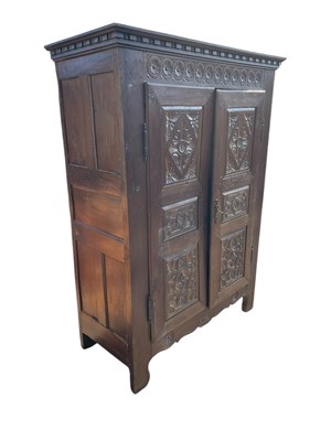 Lot 2250 - A 19th century French carved oak twin door...