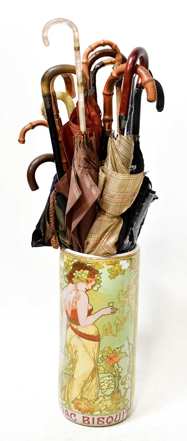 Lot 345 - A quantity of vintage umbrellas and parasols,...