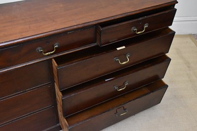 Lot 2147 - A mahogany chest of nine assorted drawers, on...