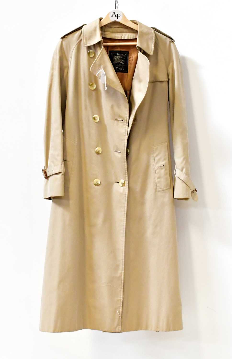 Lot 622 - BURBERRY; a raincoat with satin lining and