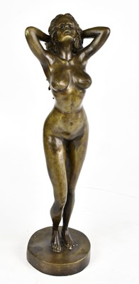 Lot 305 - A reproduction bronze figure of a nude female...