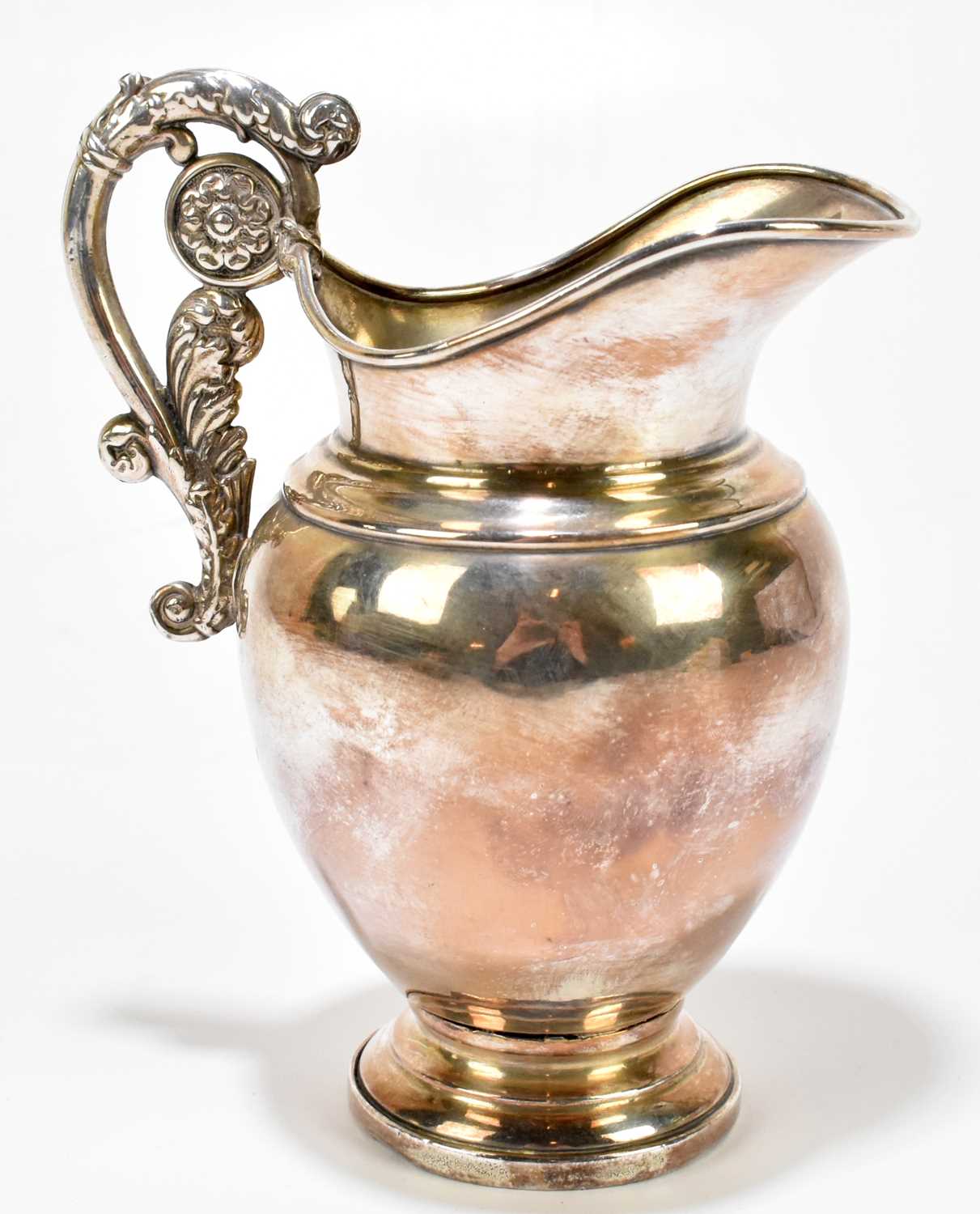 Lot 1102 - A 19th century Continental white metal jug