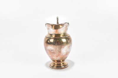 Lot 1102 - A 19th century Continental white metal jug