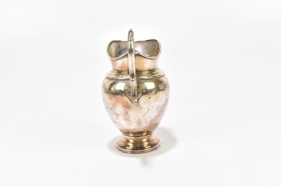 Lot 1102 - A 19th century Continental white metal jug