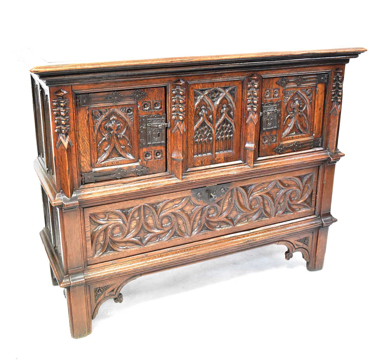 Lot 87 - A reproduction oak Dutch-style carved court...