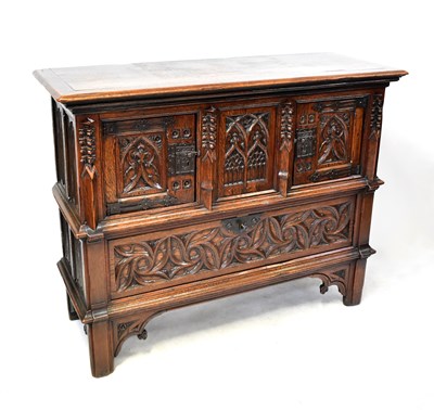 Lot 87 - A reproduction oak Dutch-style carved court...