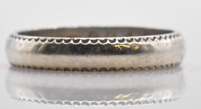 Lot 541 - A 9ct white gold wedding band, size W, approx...