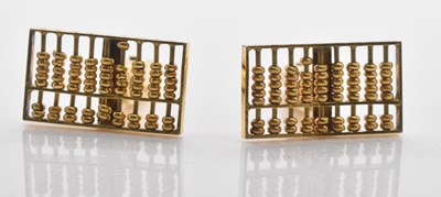 Lot 522 - A pair of yellow metal cufflinks, each...
