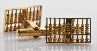 Lot 522 - A pair of yellow metal cufflinks, each...