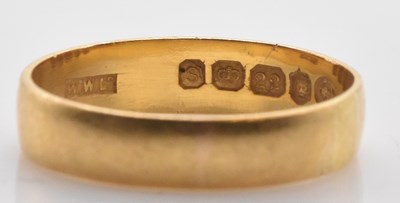 Lot 507 - A 22ct yellow gold wedding band, size Q,...