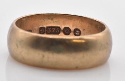 Lot 509 - A 9ct yellow gold wedding band, size O, approx...
