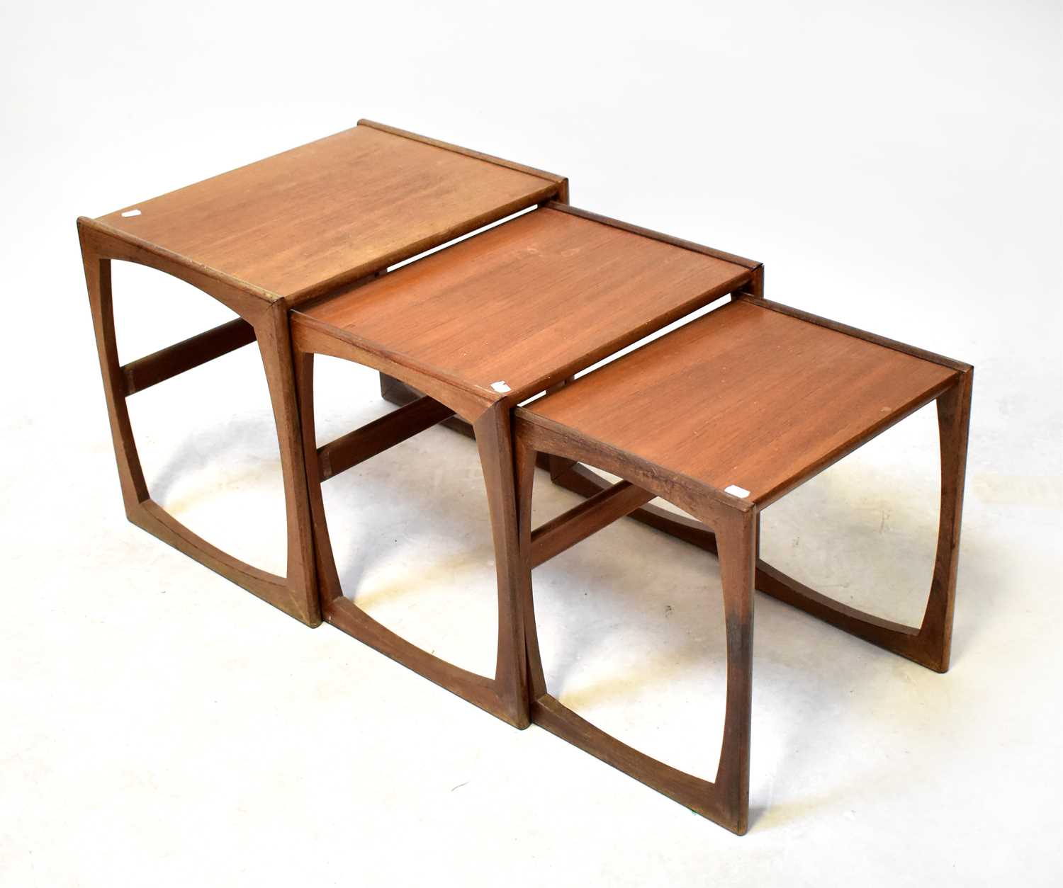 Lot 4 - G-PLAN; a mid-20th century nest of three teak '...