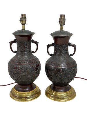 Lot 1003 - A pair of 19th century Chinese bronze twin...