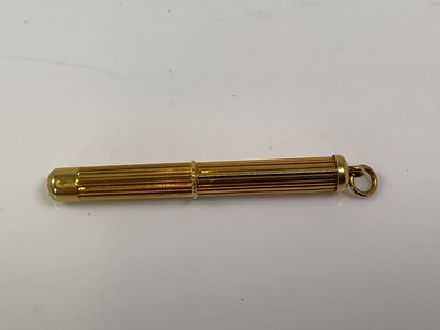 Lot 582 - An 18ct yellow gold cigar spike, with steel...