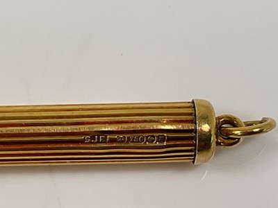 Lot 582 - An 18ct yellow gold cigar spike, with steel...