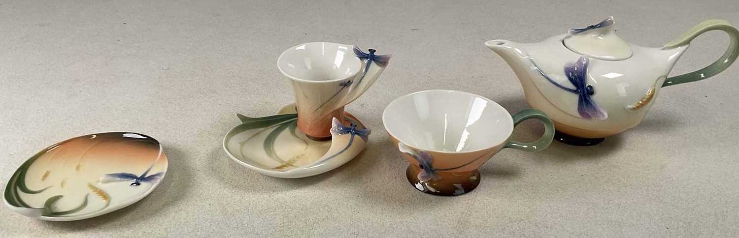 Lot 220 - FRANZ PORCELAIN; a tea for one set, comprising...