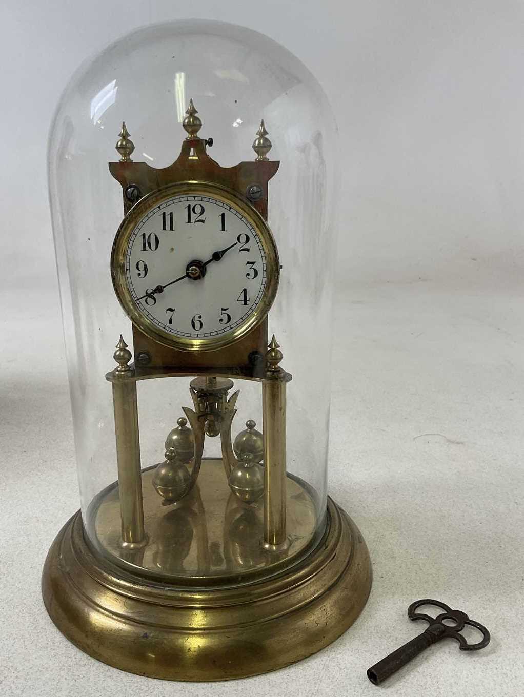Lot 653 - A brass anniversary dome cased clock, height...