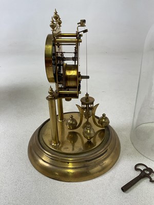 Lot 653 - A brass anniversary dome cased clock, height...
