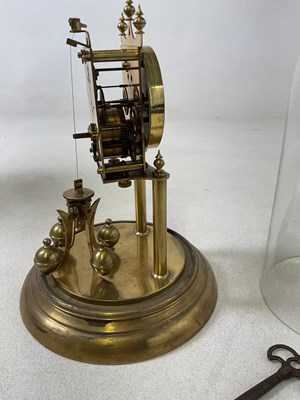 Lot 653 - A brass anniversary dome cased clock, height...