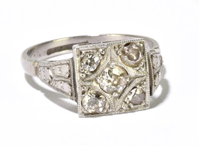 Lot 1116 - An Art Deco white metal and diamond ring with...