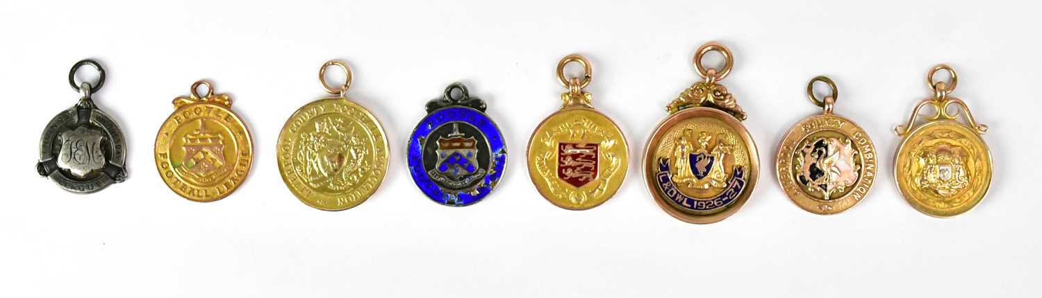 Lot 1101 - Various early 20th century football medals,...
