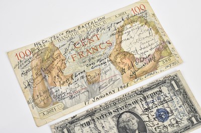 Lot 2456 - A one dollar bill and a one hundred francs...
