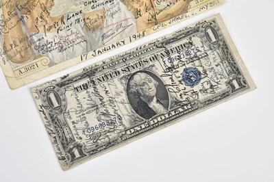 Lot 2456 - A one dollar bill and a one hundred francs...