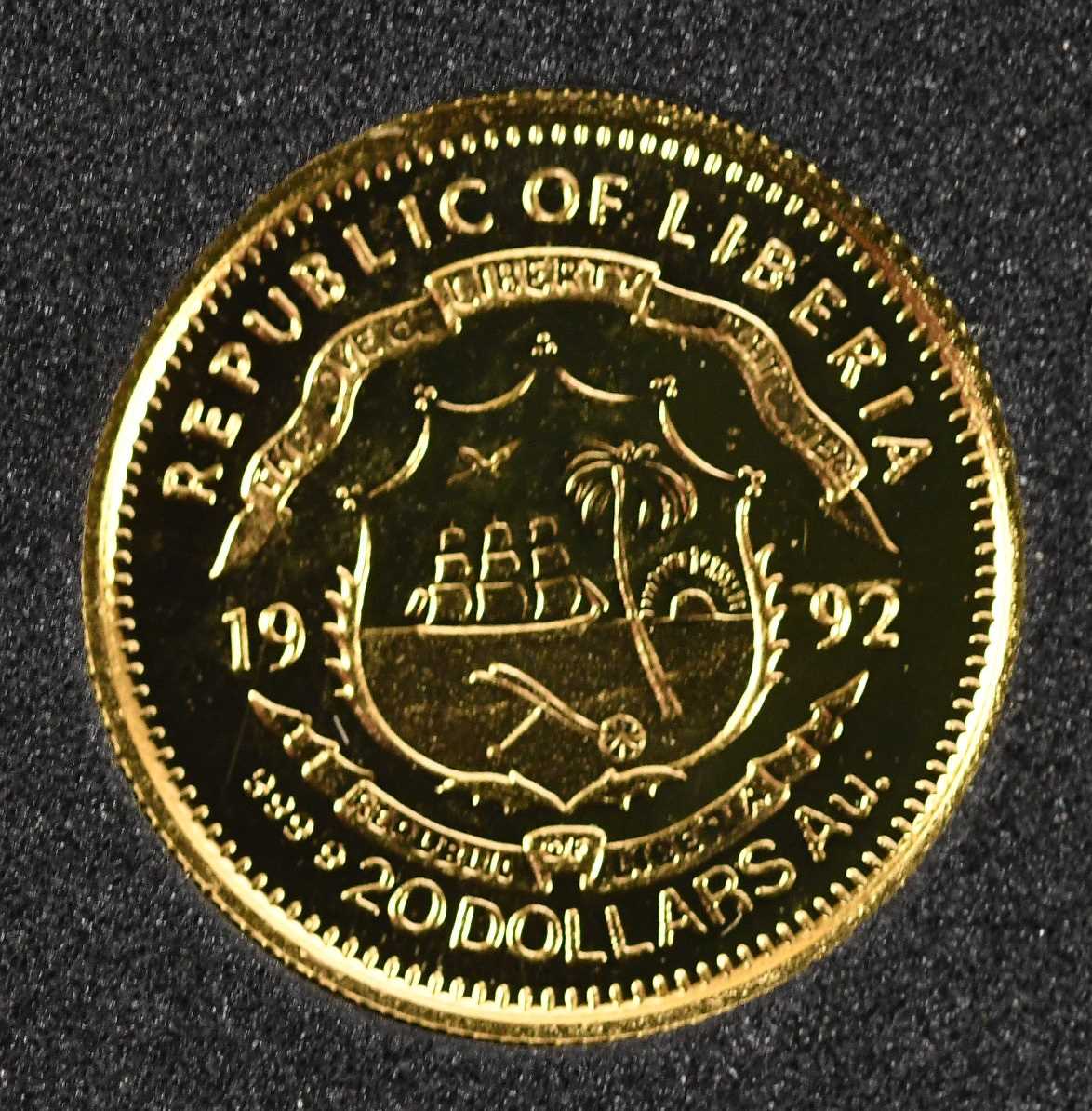 Lot 1443 - A Republic of Liberia twenty dollar 1992 gold...