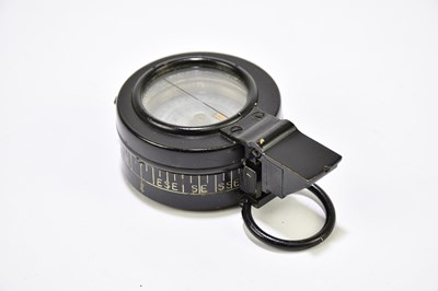 Lot 329 - A leather cased WWII compass, with applied...