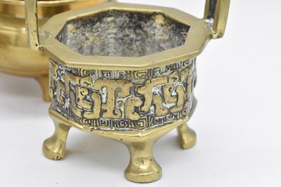 Lot 44 - Three 19th century Chinese brass vessels...