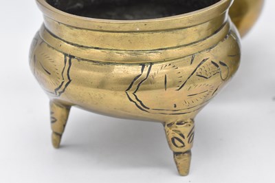 Lot 44 - Three 19th century Chinese brass vessels...