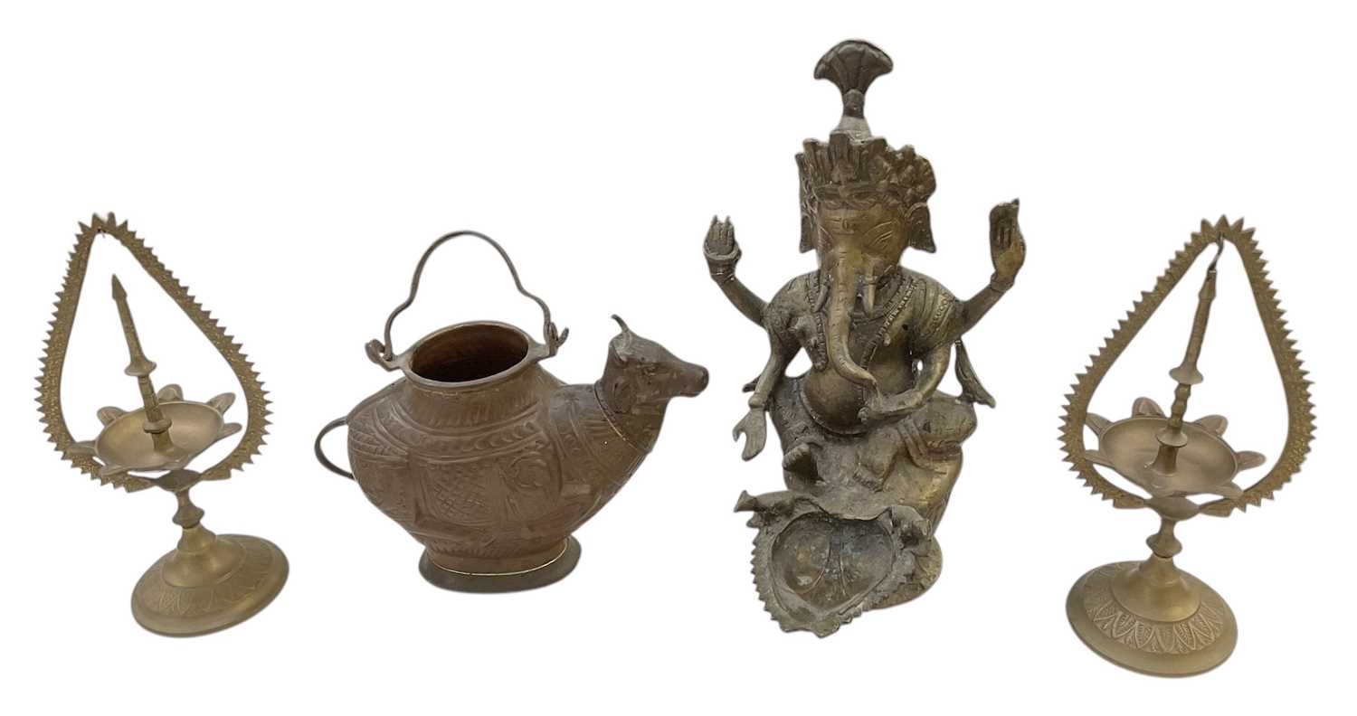 Lot 807 - A modern Indian bronze Sukunda oil lamp...