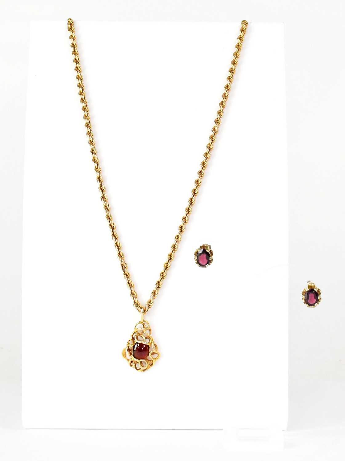 Lot 913 - A c.1970s 9ct yellow gold abstract sinuous...