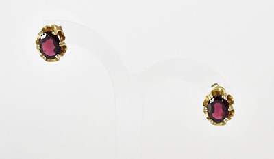 Lot 913 - A c.1970s 9ct yellow gold abstract sinuous...