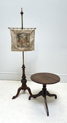 Lot 1282 - A Victorian carved walnut and brass pole...