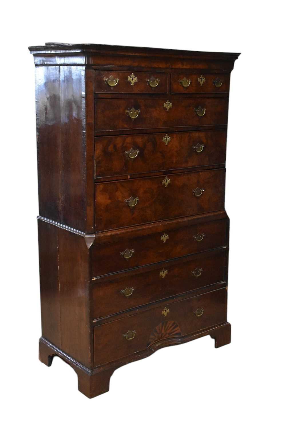 Lot 2247 - An 18th century walnut chest on chest, with...