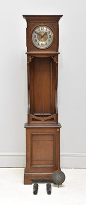 Lot 1020 - An Art Nouveau carved and panelled oak...